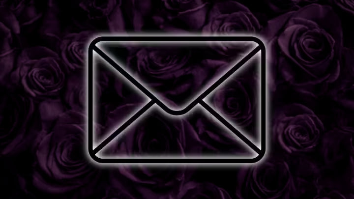 Neon email icon on a dark background with purple roses